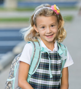 Smiling Student with Backpack